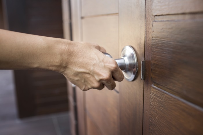Hand on door handle